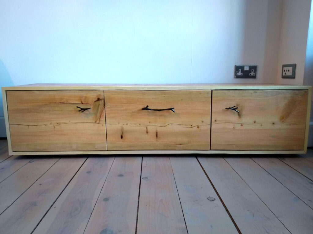 solid TV unit with 3 natural effect doors